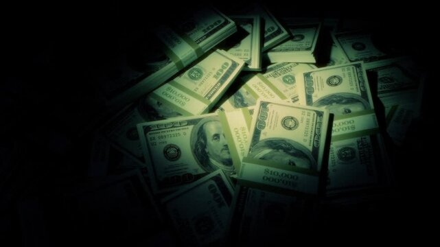 Torch Reveals Pile Of Money In The Dark