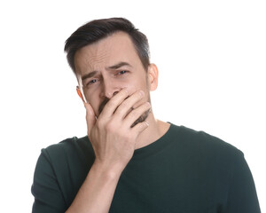 Portrait of sad man crying on white background