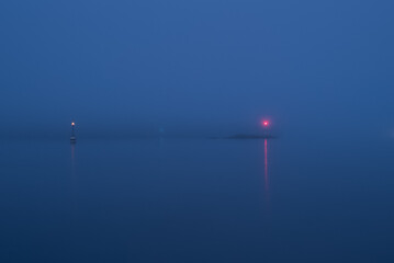 Lighthouses in misty, blue weather. 
