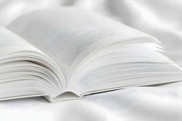Obraz premium Open Book, Pages Lay Flat, Textured White, Knowledge Beckons, Inviting Readers to Explore Literary Worlds with Unwavering Curiosity.