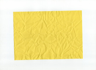 Texture of crumpled yellow paper on white background