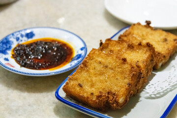 Pan-Fried Carrot Cake served in dish