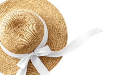 Elegant straw hat with white ribbon isolated on white background.
