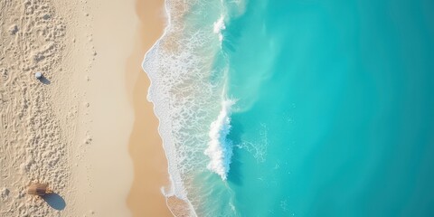 Aerial View of Turquoise Ocean Waves Meeting Sandy Beach 