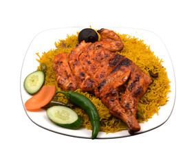 Alfahm grill fried chicken majboos rice in a white ceramic plate