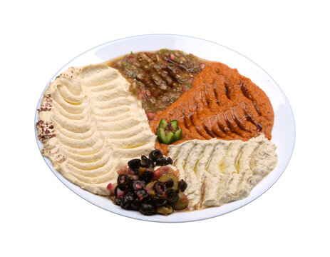 Mixed Hummus large platter plate with olive oil, mutabel, tahini, tzaziki and babaganosh