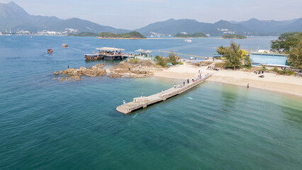 DEC 26 2024,Hong Kong.Sharp Island road sign, Sharp Island is one of the Hong Kong UNESCO World Geoparks. The sandbar is not always visible as it only appears at low tide.