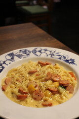 German cuisine: spätzle with cheese sauce and sausages
