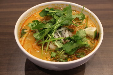 Vietnamese cuisine: tom yum pho (rice noodles with tom yum)