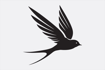 A black silhouette of a flying swallow.