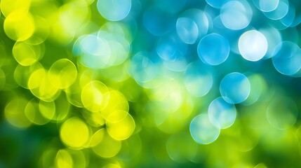 Fototapeta premium Abstract blue and green bokeh background with blurred circles for christmas or spring themes