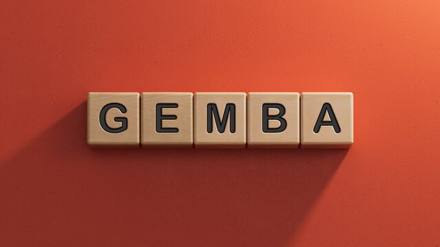 Word gemba. Wooden small cubes with letters with copy space available.close up of wooden elements,Business Concept.3D rendering on red background.