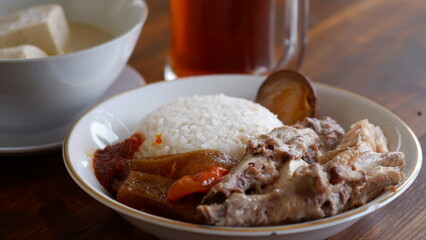 Gudeg Ceker Ayam or Gudeg Chicken Feet. Gudeg is a traditional dish from the city of Yogyakarta made from jackfruit cooked with coconut milk and palm sugar.