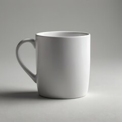 Obraz premium Blank White Ceramic Mug Mockup Standing Upright On A Clean White Surface, With Soft Shadows And A Minimalist Background