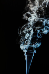 The smoke is thick and dark, creating a mood of mystery and danger