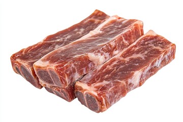 Obraz premium Three raw beef short ribs isolated on white.