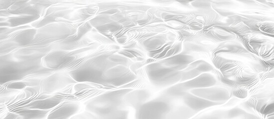 Abstract grayscale image of flowing water surface.