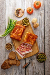 smoked lard with bread and pickled cucumbers
