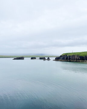 Rocky shores with calm waters