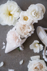 lush florals and bridal heels at luxury wedding