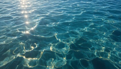 Sunlight dancing on transparent ocean water