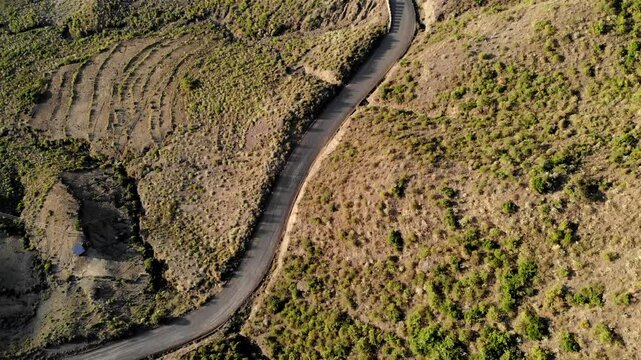 Car driving on Curvy dirth road in Ethiopia Mountains- Aerial footage
Drone voew over Car driving on Curvy dirth road in Ethiopia Mountains
