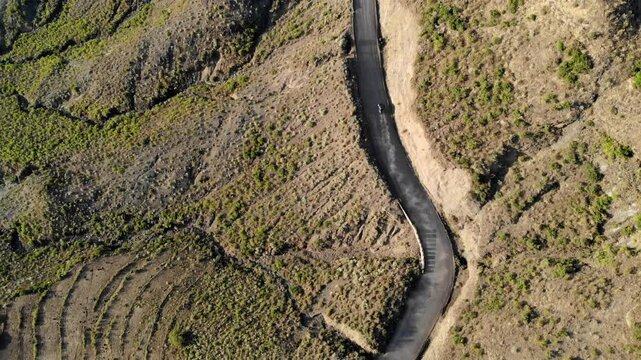 Car driving on Curvy dirth road in Ethiopia Mountains- Aerial footage
Drone voew over Car driving on Curvy dirth road in Ethiopia Mountains
