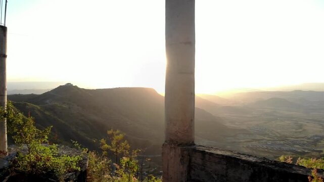 African sunset between abandoned pillars and mountains
African sunset around Lalibela between abandoned pillars, Ethiopia 
