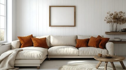 Fototapeta premium Modern living room interior with beige sectional sofa, wooden coffee table, and blank frame on white wall.