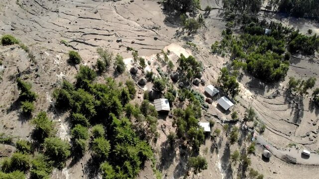 Aerial footage over small Village and fields in Ethiopia
Drone view over Lalibela village's landscape and fields, Ethiopia
