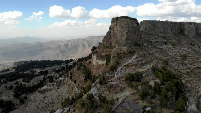 Aerial footage over large rocky mountain in Africa, Ethiopia
Aerial footage over Lalibela Mountain, Ethiopia
