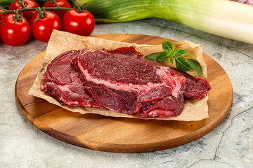 Raw beef cheeks cut for cooking