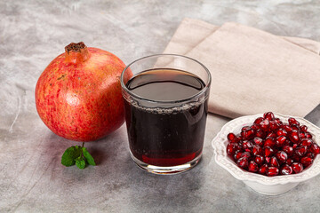 Sweet fresh pomegranate juice with fruit