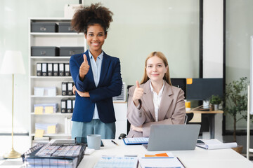 Creative team web designer feel happy work complete Teamwork planning application, success at work in the office concept.