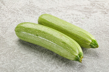 Raw green ripe zucchini vegetable