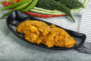 Spicy chicken masala in the bowl