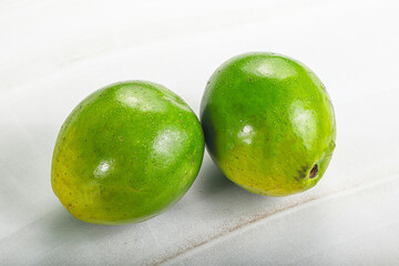 Two ripe green exotic avocado fruit