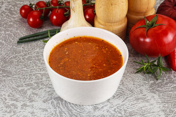 Hot tomato soup with diced chicken
