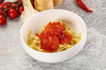 Italian pasta pappardelle with chorizo