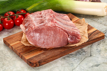 Raw pork loin cut with bone