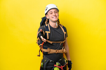 Young rock climber Brazilian man shaking hands for closing a good deal