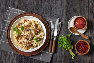 beef and rice in white bowl, top view