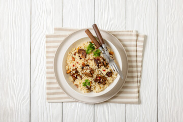 beef and rice in white bowl, top view