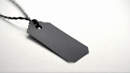 black product tag with text on white background