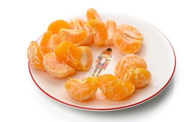 Bright citrus segments arranged beautifully on a decorative plate showcasing vibrant colors and inviting freshness