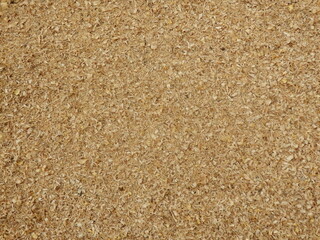 Close up of sawdust created by cutting logs
