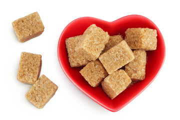 brown sugar in a ceramic bowl isolated on white background. Top view. Flat lay