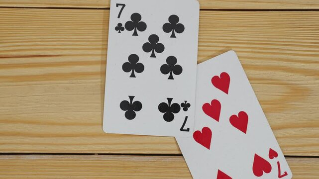 A winning combination of playing cards on a wooden background. card gambling. casino.