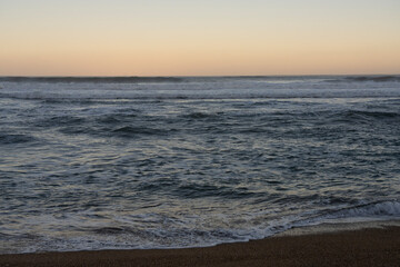 Beach and sea background, view of the Atlantic ocean, from a city in Europe. 
