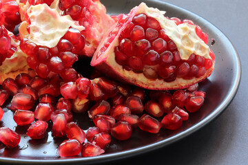 a pomegranate in a plate